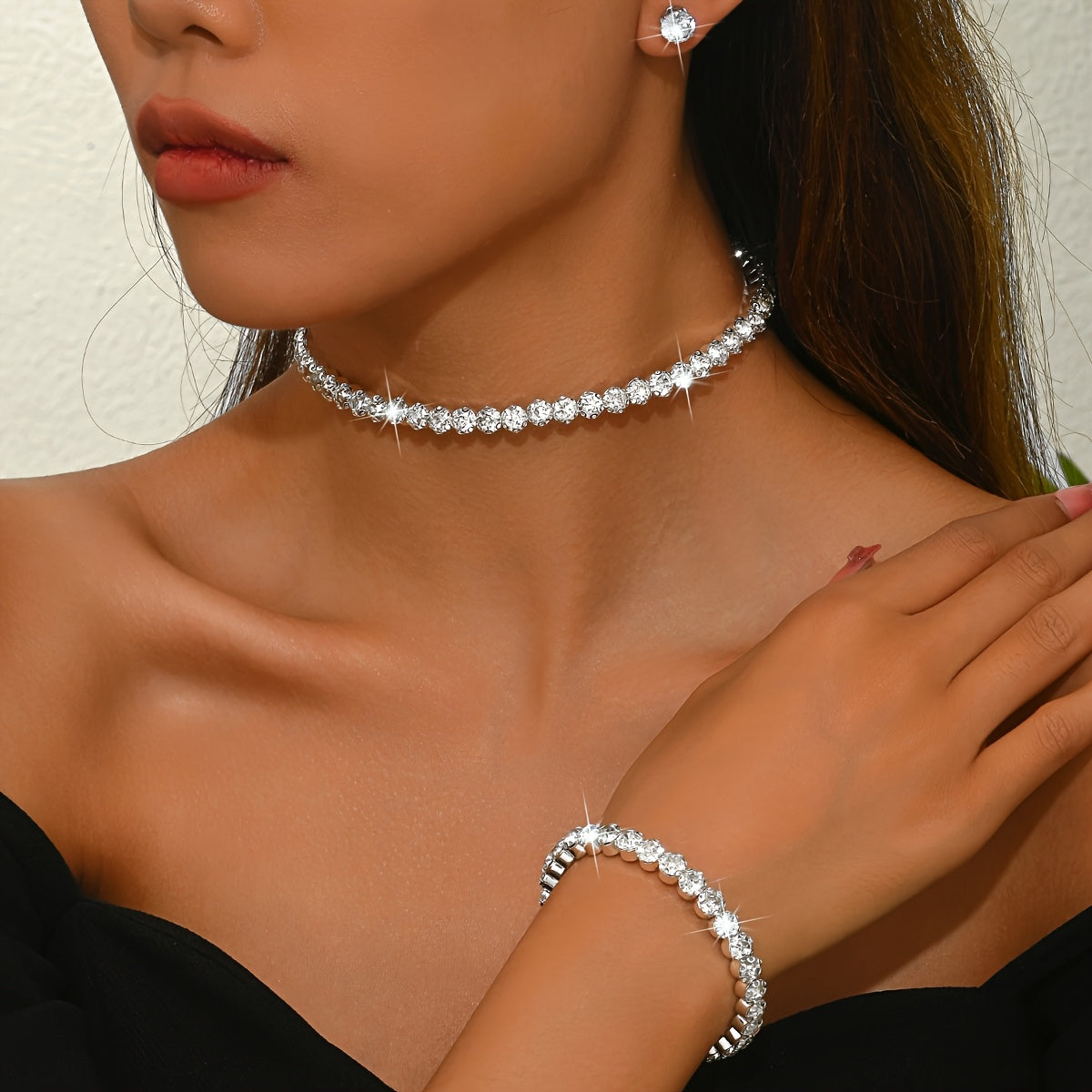 Conjunto de pendientes, pulsera y collar