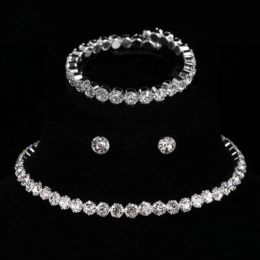 Conjunto de pendientes, pulsera y collar